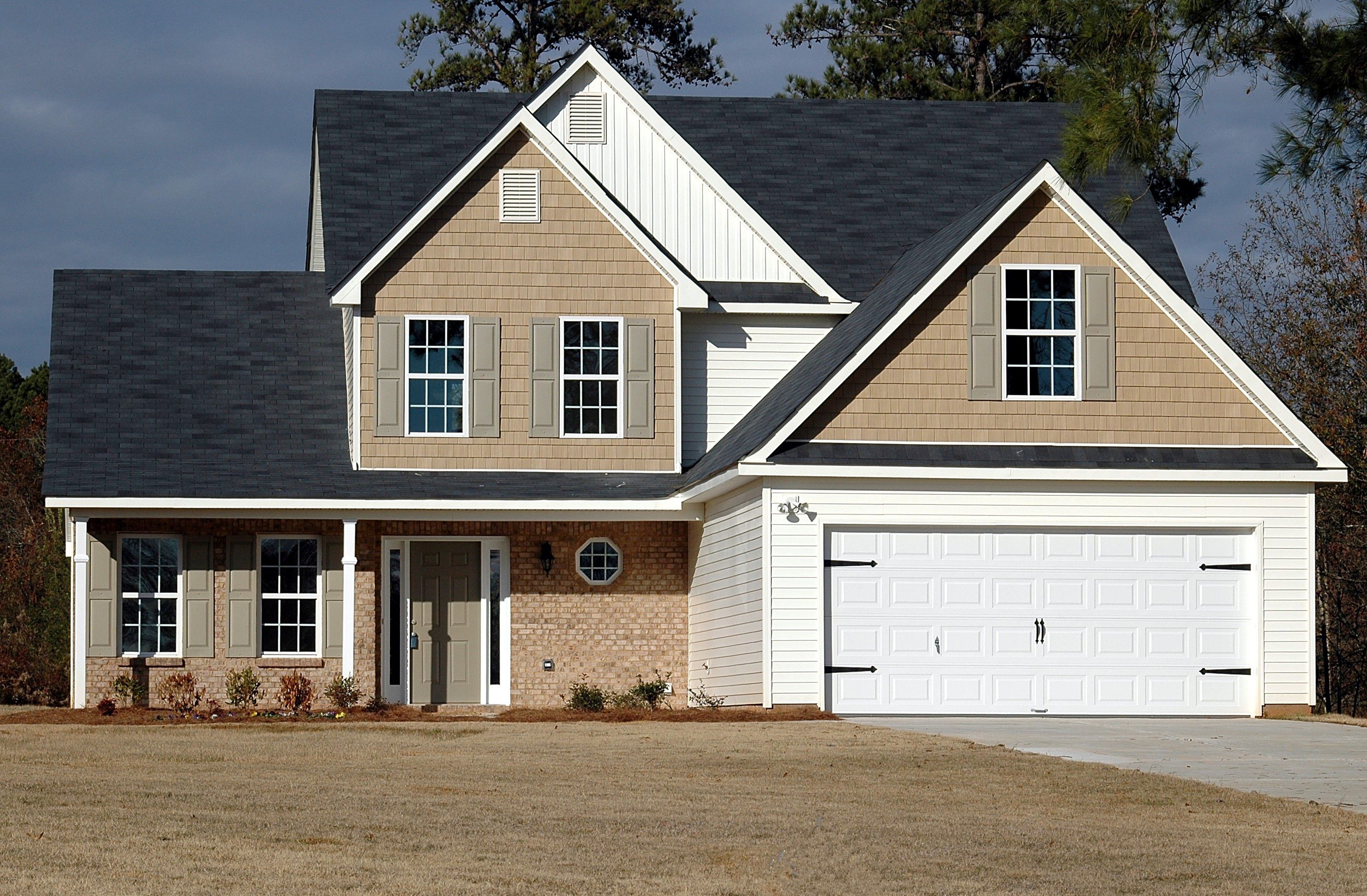 Beautiful home with a newly installed garage door by MTB Doors