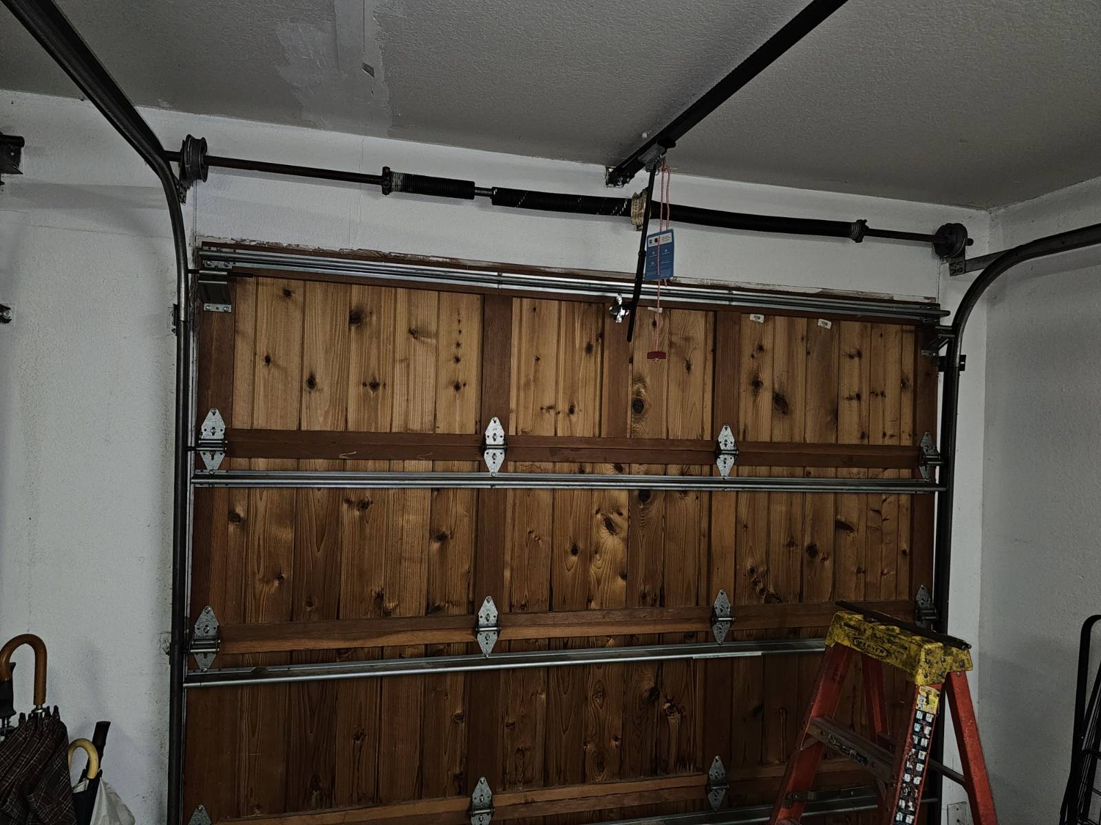 Before broken garage door spring repair