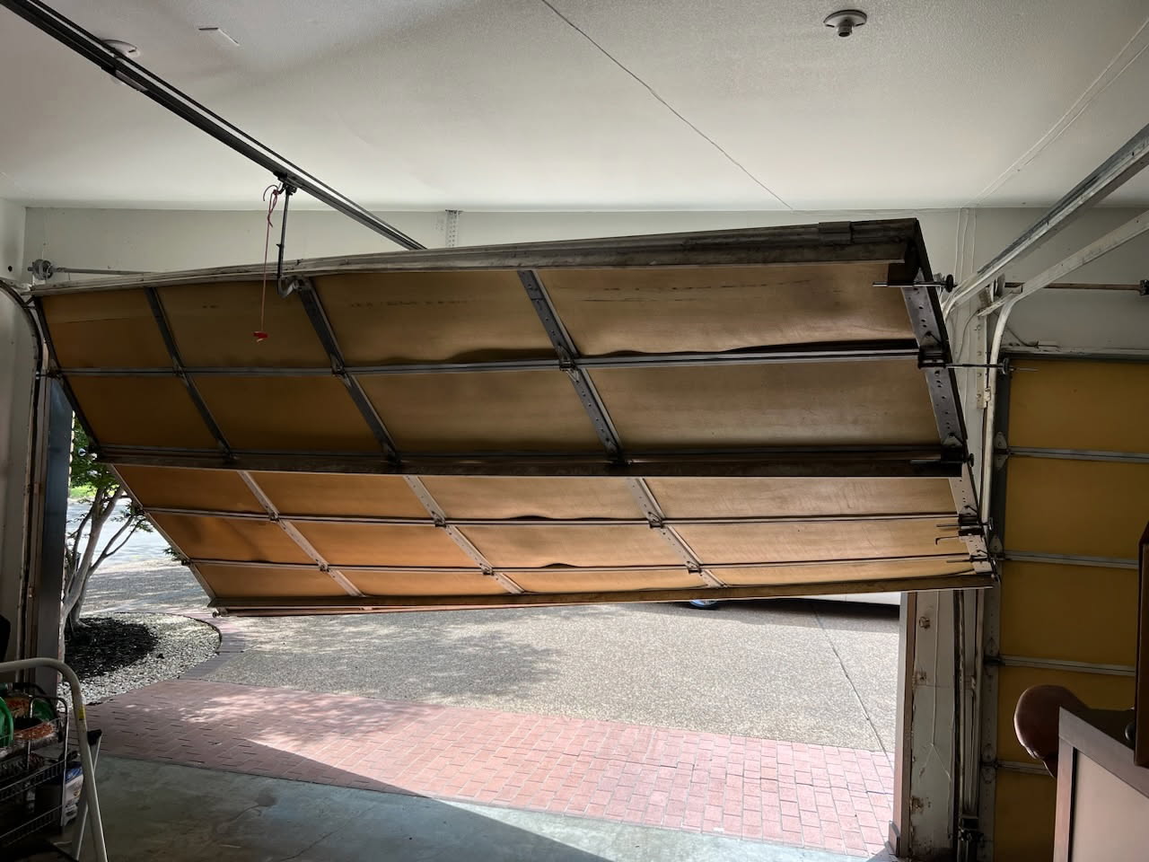 Before off-track garage door repair